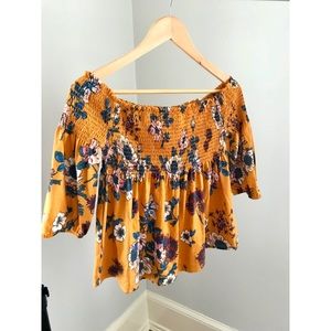 Off-the-shoulder top with floral design